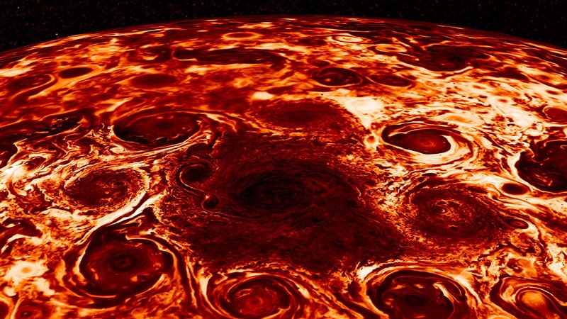 Imagen en infrarrojo de Júpiter, exactamente de los ciclones del polo norte.
