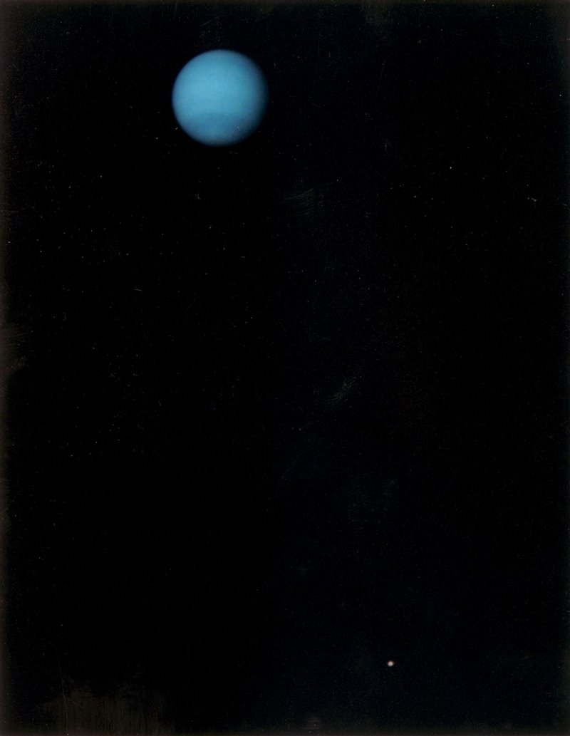 Neptuno y Tritón, una de sus lunas