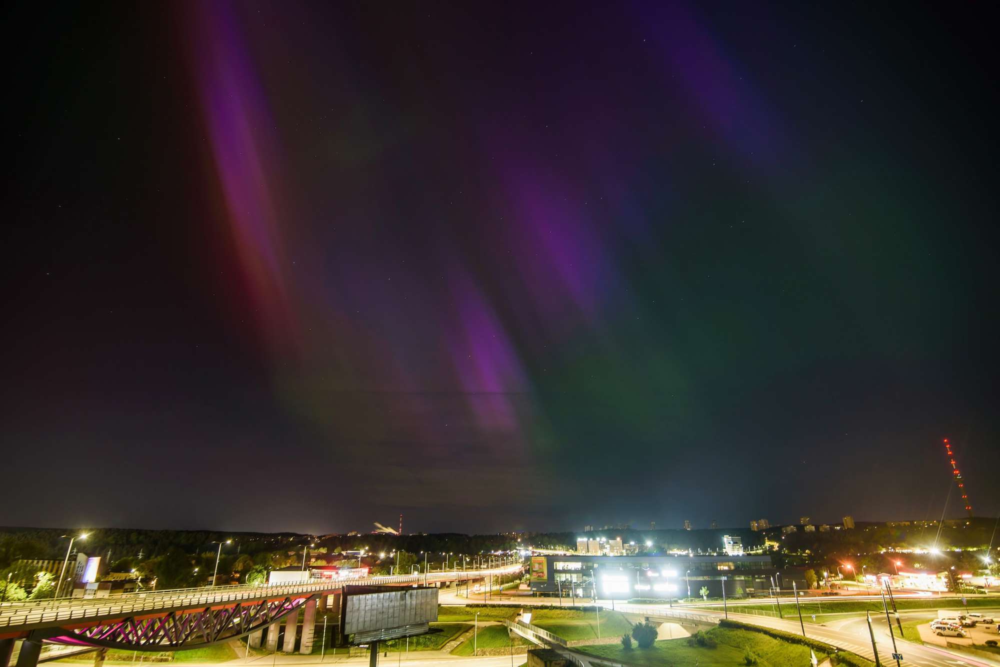 Northern lights (Aurora Borealis) shine in the night sky in Vilnius. Strong geomagnetic storm hits Earth, making the Northern lights visible at much lower latitudes than usual. (Photo by Yauhen Yerchak / SOPA Images/Sipa USA)